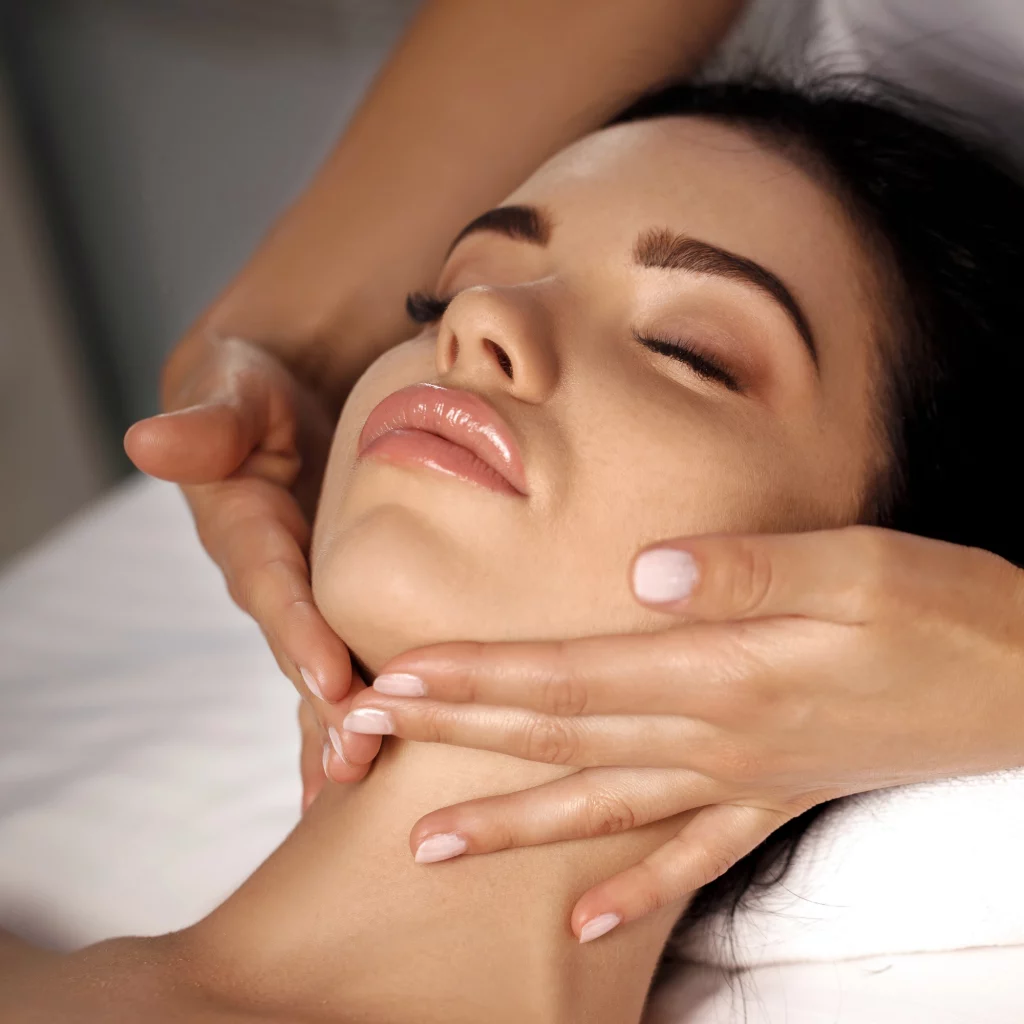Facial massage during a signature facial treatment at Etica Clinic London